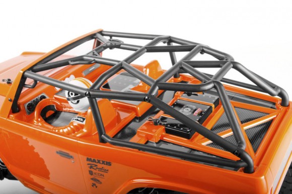 DOVE-TAIL CAGE The universal dove-tailed bolt-in cage is made to fit rig bodies modified for maximum clearance. This cage works with AX04038 Jeep® Wrangler Rock Racer Body and AX04039 AX10 Deadbolt Body.