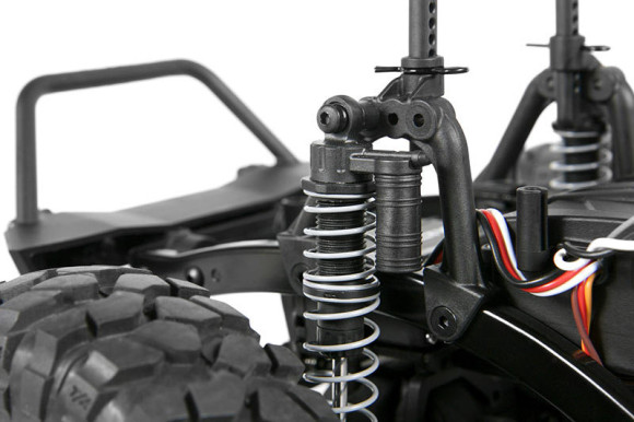 ADJUSTABLE COILOVER SHOCKS The shocks on the SCX10 feature dual rate springs which help deliver maximum off-road performance. They are oil filled shocks which allow you to tune the dampening rate. Shock hoops on the SCX10 frame allow for multiple shock positions for tunable performance. There's also coilover shock reservoirs for realistic scale looks.