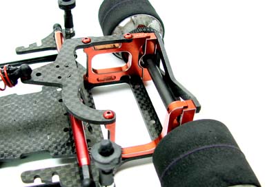 The #3263 new dual (fits altered ego and standard) extended upper plate, extends the upper rear shock mount to utilize the matching longer front shock positions in the chassis, .250 and .5" extended. Fits all road cars with the Slider rear pods. Xti, Altered Ego,SE. 2.5 mm QHM material. Part #3263 - Dual Extended Upper Plate Retail $12.99 UPC: 800734032632