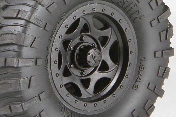 WALKER EVANS RACING WHEELS Officially licensed Walker Evans Racing wheels are molded from a blend of high quality nylon materials for strength and durability with a solid 12mm hex mount and dressed in black for the stealthy race look. 1.9 RIPSAW TIRES STICKY R35 COMPOUND The aggressive tread design and impressive ground clearance offer a realistic look for the image-conscious scale crawler who is also looking to improve their performance game. • Realistic and aggressive tread design for the ultimate scale appearance and maximum grip provided by our sticky R35 compound • 4.3" (109mm) tall for extreme ground clearance • Molded ribbing between the lugs help keep mud and snow from packing into the tire tread • Recessed lugs for additional traction