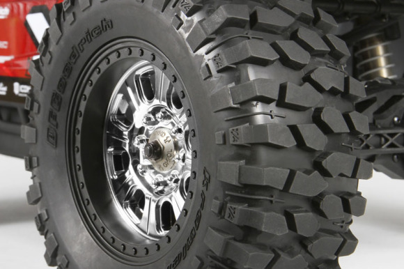 BFGOODRICH® KRAWLER™ T/A® KX TIRES BFGoodrich has more than three decades of off-road racing commitment under their belt, scoring 23 SCORE Baja 1000 championships and 26 Score Baja 500 championships from 1975 - 2010! In the full-size off-road world, BFGoodrich® Krawler™ T/A® KX tires are the winner of more rock-crawling championships than all other tires combined (Race spec tire, Years 2004 through 2008). The Axial version of this tire captures the same aggressive look and provides awesome performance on a wide variety of surfaces. This is the perfect tire for this style of vehicle due to its high level of performance and diversity. Tires - 74x184mm (2.9x7.25") BFGoodrich® Tires and KRAWLER™ T/A® Trademarks are used under License from Michelin 